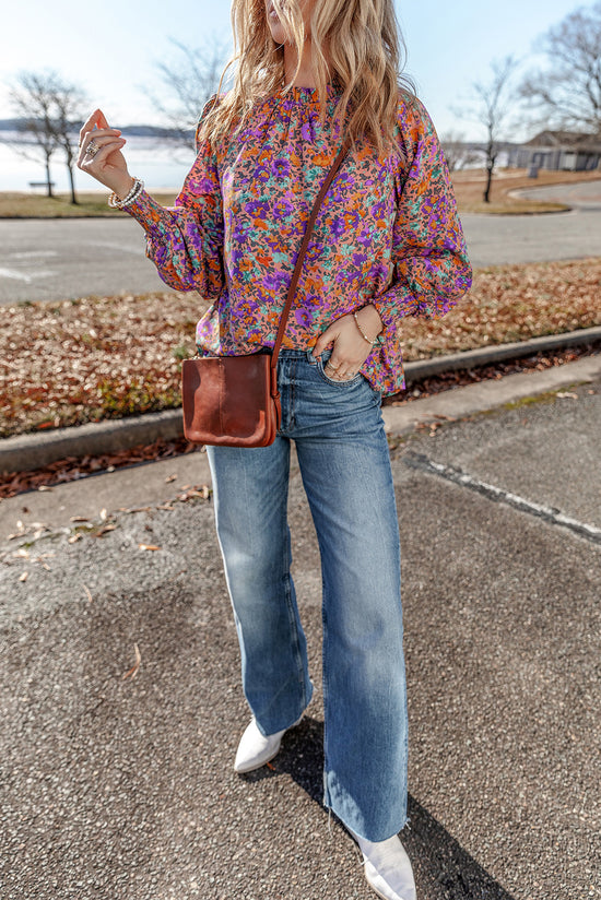 Blusa violeta con estampado floral *