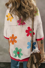 T-shirt with drooping shoulders and contrasting border with pink floral eyelets