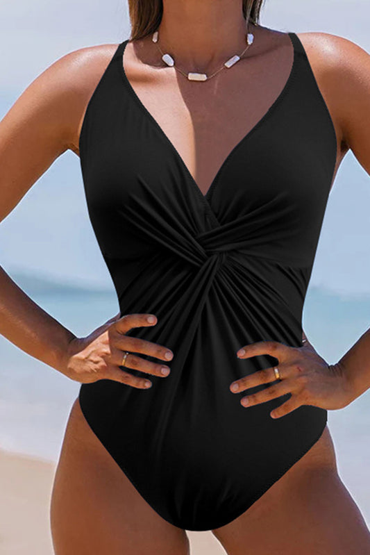 Maillot de bain une pièce noir, col en V, froncé, croisé, dos nu, une pièce