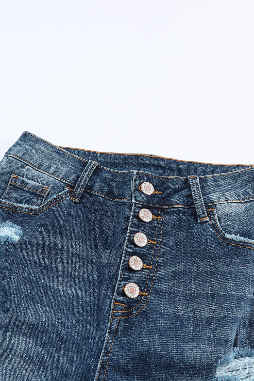 Bouton en détresse bleu Jean skinny haute taille