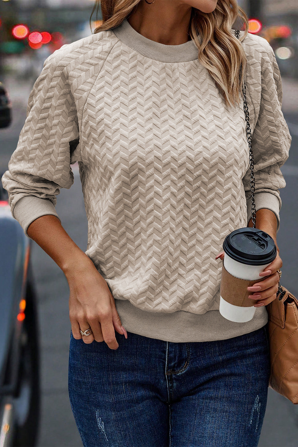 Sudadera beige texturizada une con manga raglán