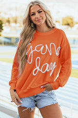Sudadera gráfica de hombro caída y day de juegos de ruso naranja guirnaldas