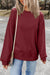 Solid burgundy sweatshirt with dropped shoulders and round neck