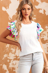 White textured high with puffy sleeves