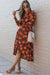 Orange floral print wrap dress with belt