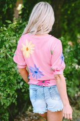 Camiseta con estampados florales rosa hinchado