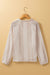 White buttoned shirt in openwork lace with puffy sleeves