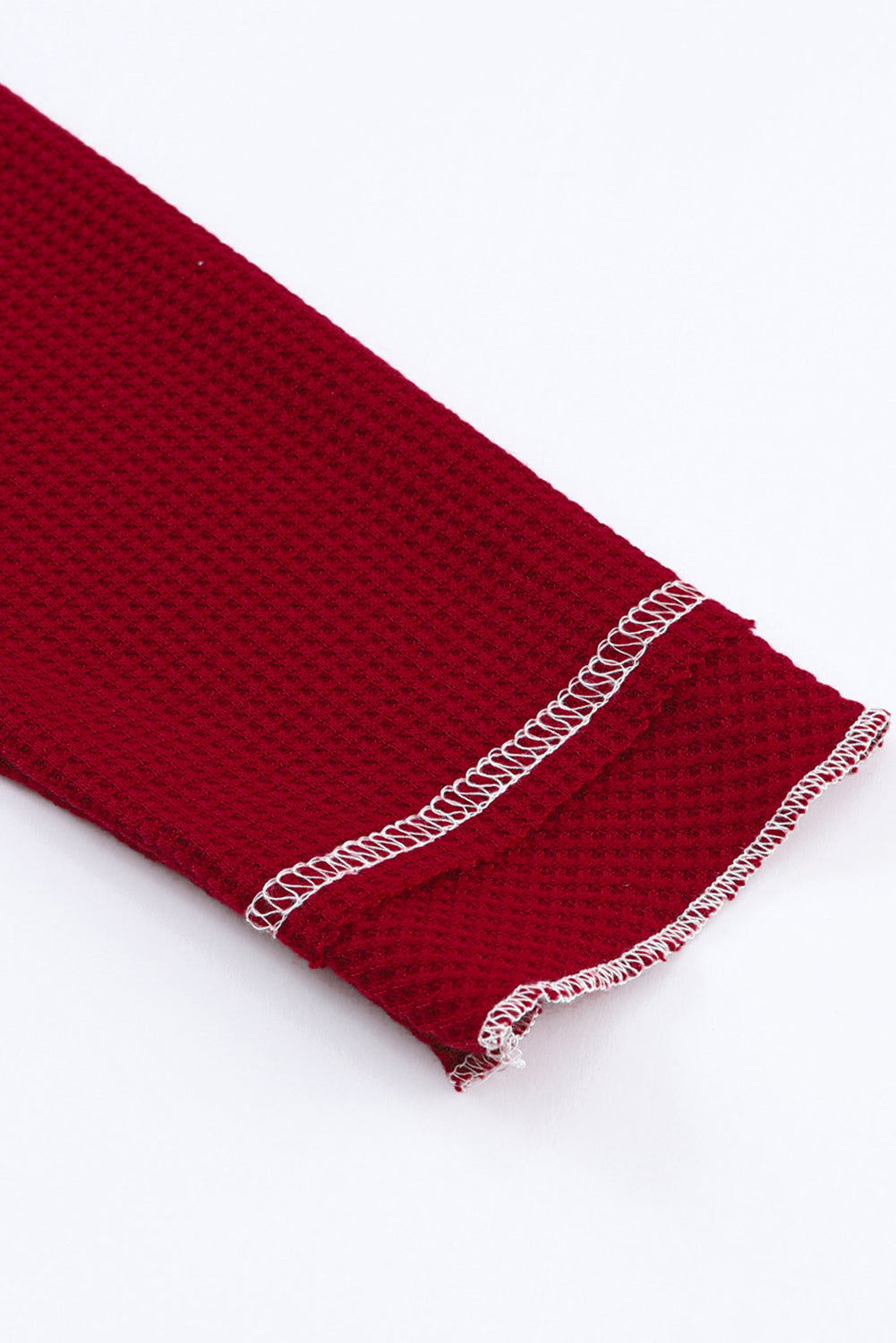 Haut texturé à manches longues et col rond rouge vif *
