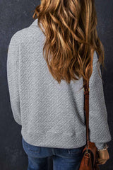 Sudadera gris con media fera éclair textúe uni