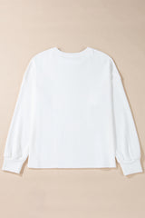 Sudadera suelta blanca con nudo de mariposa y hombros caídos