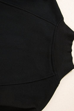 Black zip-up sweatshirt with dropped shoulders