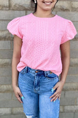 Camiseta rosa texturizada con mangas hinchadas