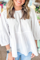 Chemisier blanc avec nœud papillon et découpe au dos, coupe ample, manches 3/4-A WOMAN WE LOVE