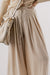 Large pleated leg relaxed pants with beige tightening cord