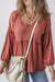 Puffy sleeve blouse and V -collar with tuffled ruffled in a solid mineral red colored