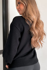Black shoulder sweater and Halloween pumpkin face pattern