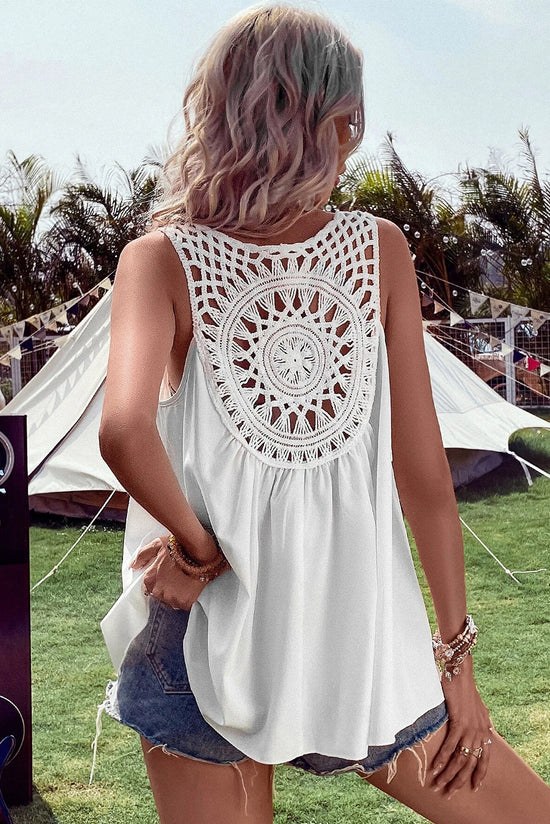 Sleeveless white tunic *