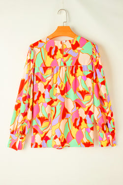 Yellow blouse with puffy sleeves and abstract print