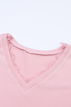 Long sleeve top and pink V -collar with ribbed texture and lace border