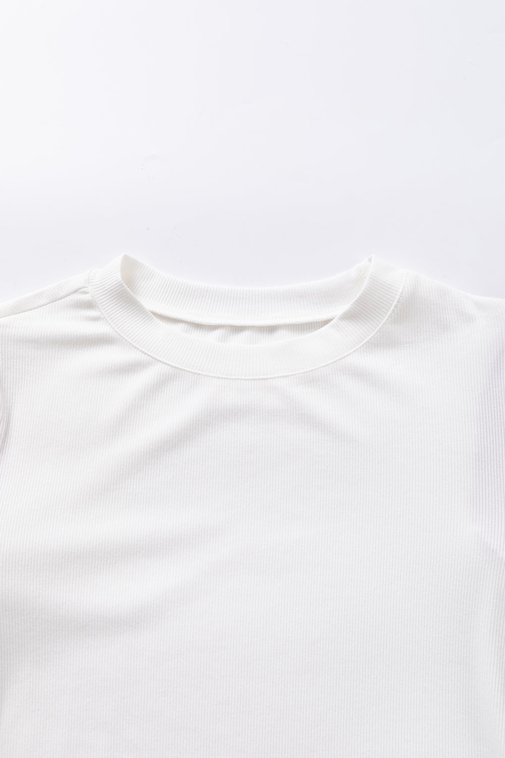 White top with puffy sleeve in contrasting tweed