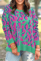 Green baggy sweater with abstract print and ribbed trim