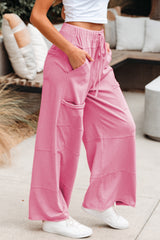 Pantalon à jambes larges rose délavé