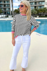 Black striped top with long sleeves and contrasting edges