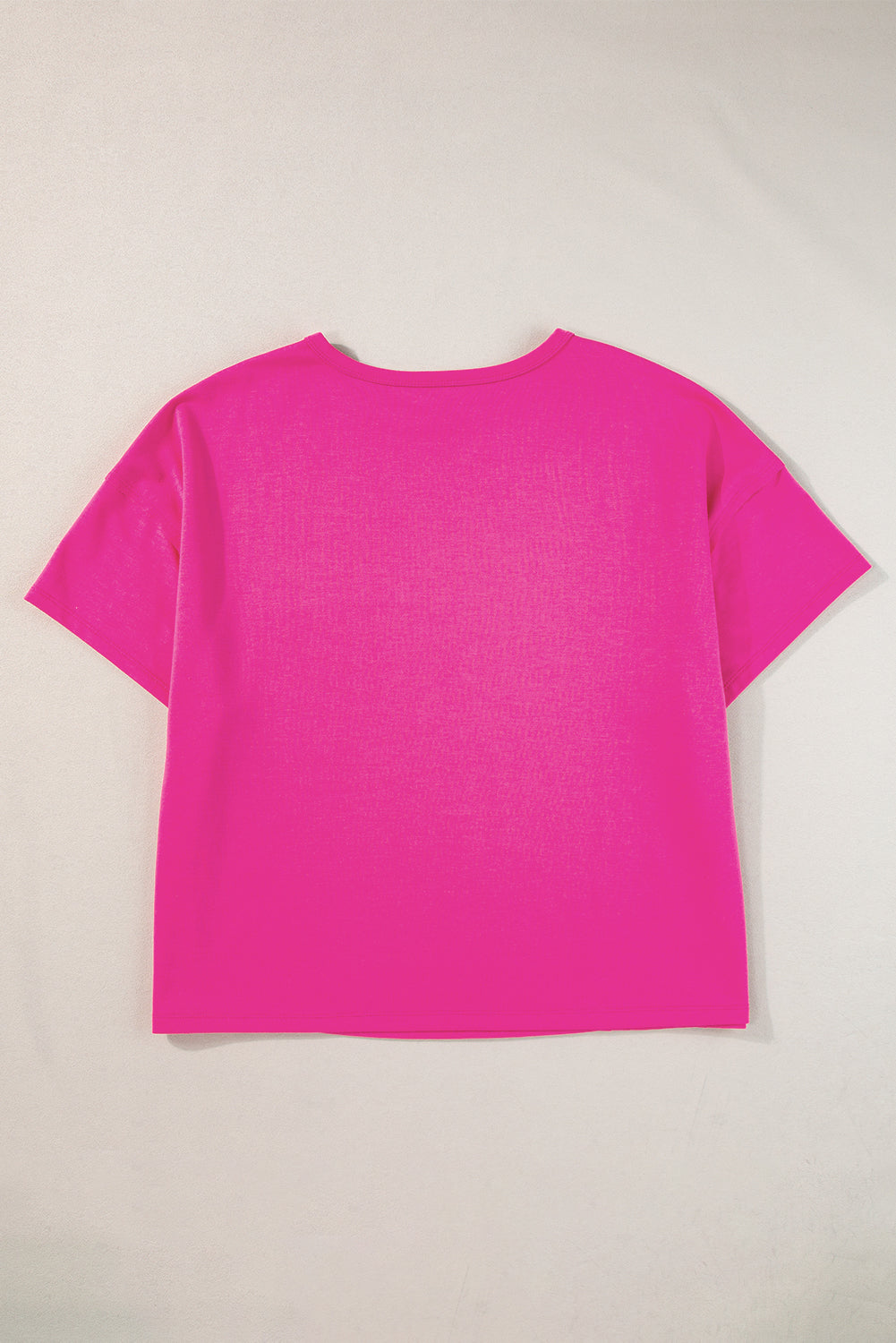Camiseta de gran tamaño en rosa brillante con bolsillo chapado y costuras aparentes