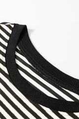 Long sleeve top and drooping shoulders with black stripes