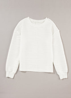 White long sleeve drop shoulder top with wavy texture