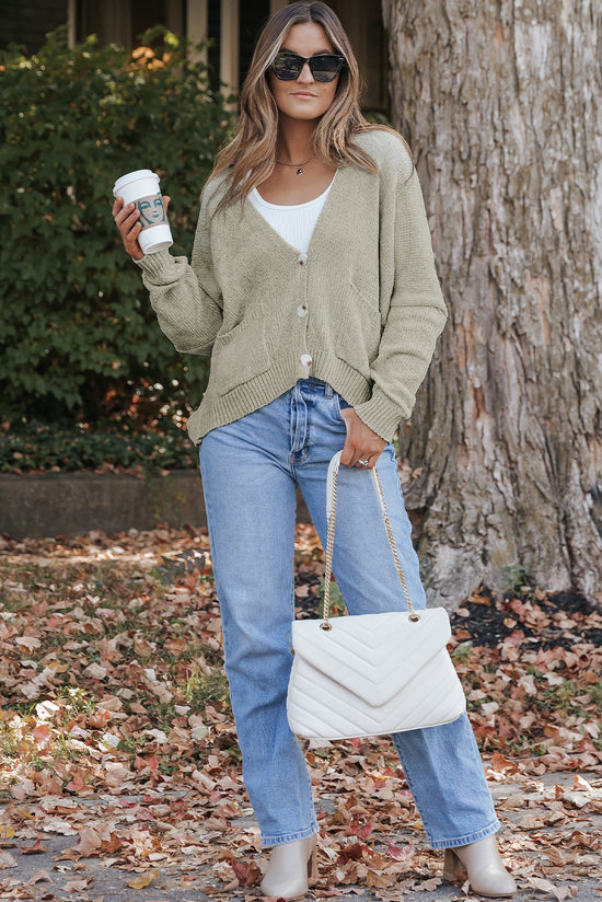 Grey sweater cardigan with front pockets and buttons