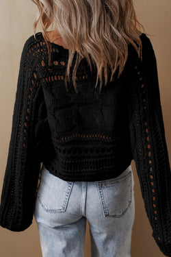 Short black sweater in Twisted Twisted mesh