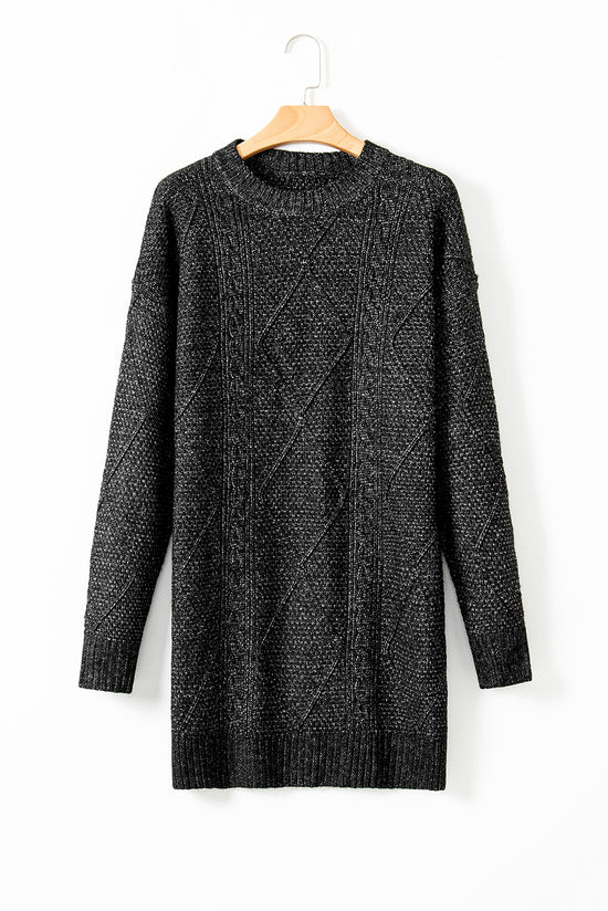 Large black sweater dress in twisted knitted with drooping shoulders