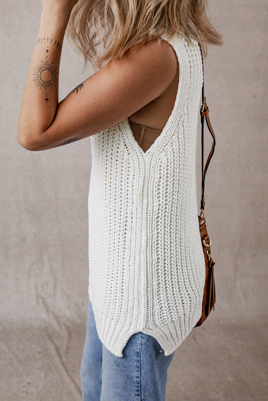 Gilet pull blanc à col roulé et ourlet fendu