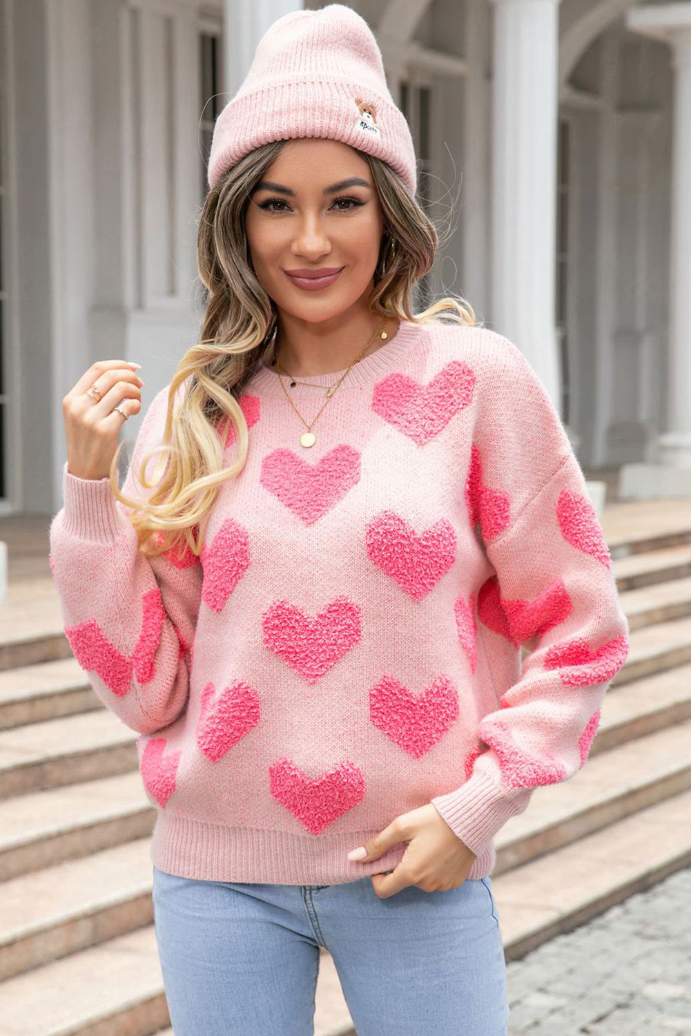 Pull en tricot de coeur de la Saint-Valentin rose clair