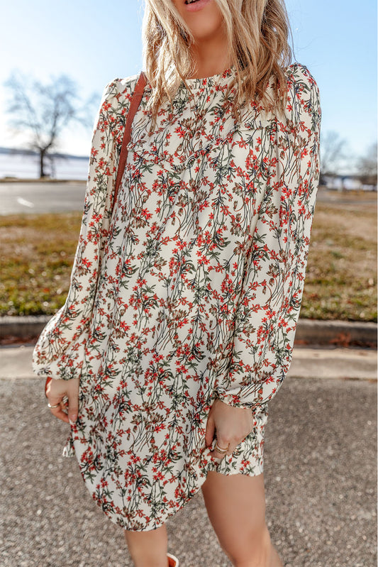 White long sleeve mini dress with floral print