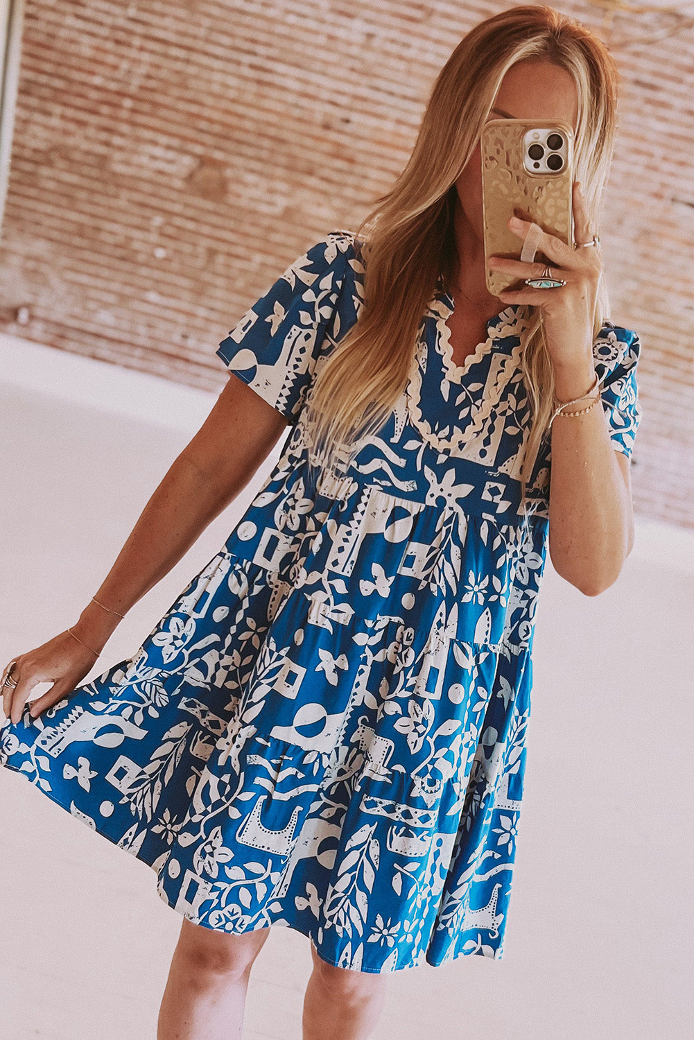 Blue floral loose dress with split collar and Ricrac border