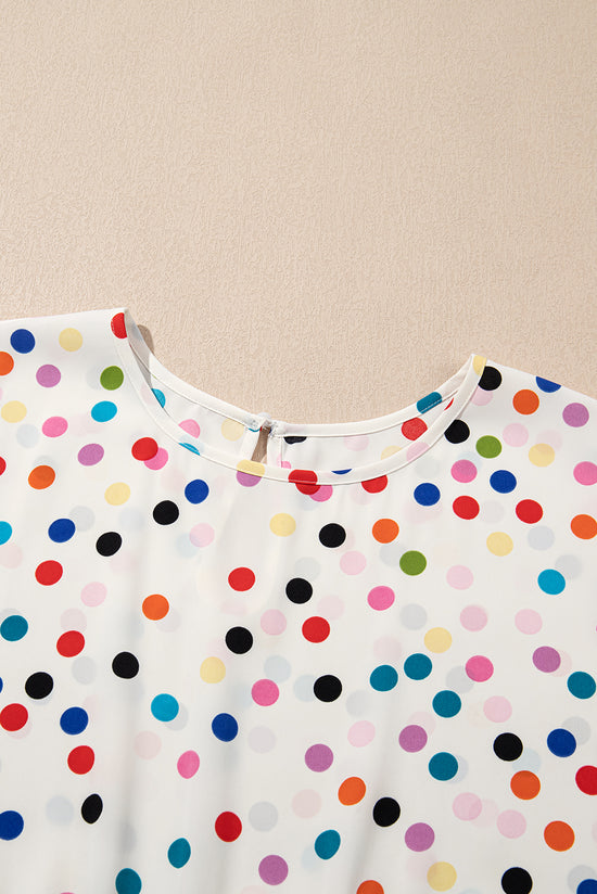 Blusa grande con lunares de color *