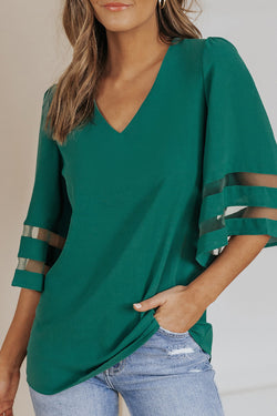 Green loose blouse with flared sleeve and v -collar