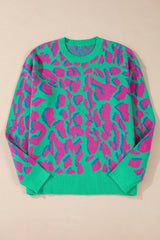 Green baggy sweater with abstract print and ribbed trim