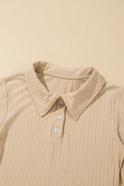 High beige buttoned collar and long sleeves, slim cut