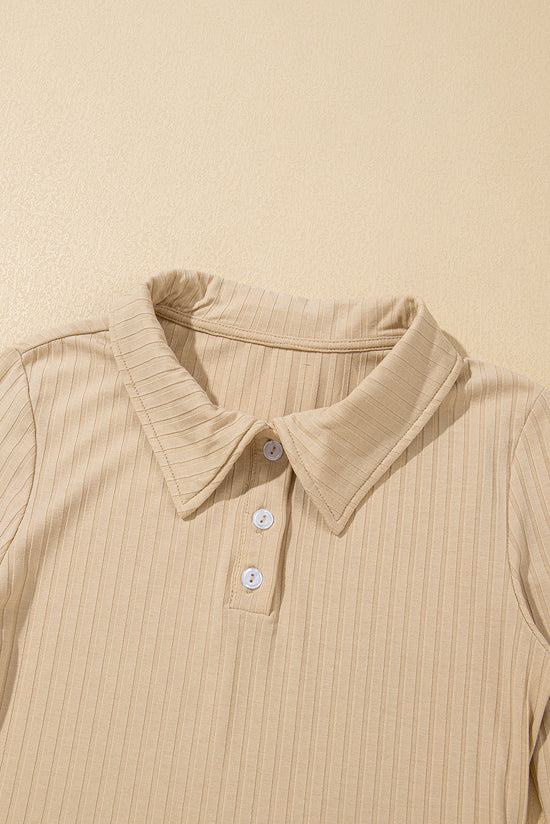 High beige buttoned collar and long sleeves, slim cut