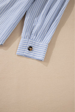 Long sleeve shirt buttoned with sky blue striped