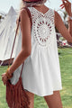 Sleeveless white tunic *