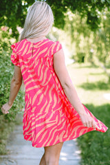 Pink dress with pockets and ruffle border printed with zero stripes