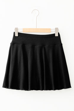 Jupe-short trapèze noire taille haute drapée *