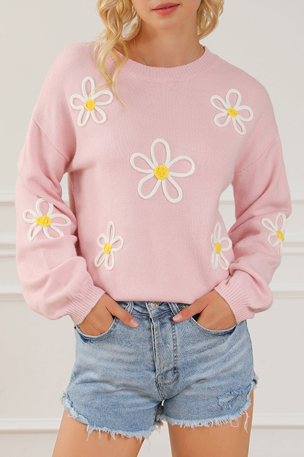 Pink chenille crew neck sweater with daisy stitching