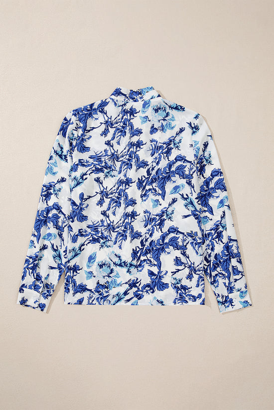 Elegante blusa con cuello con muescas y estampado floral azul floral