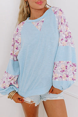 Beau Blue - Textured blouse with balloon sleeves and floral patchwork