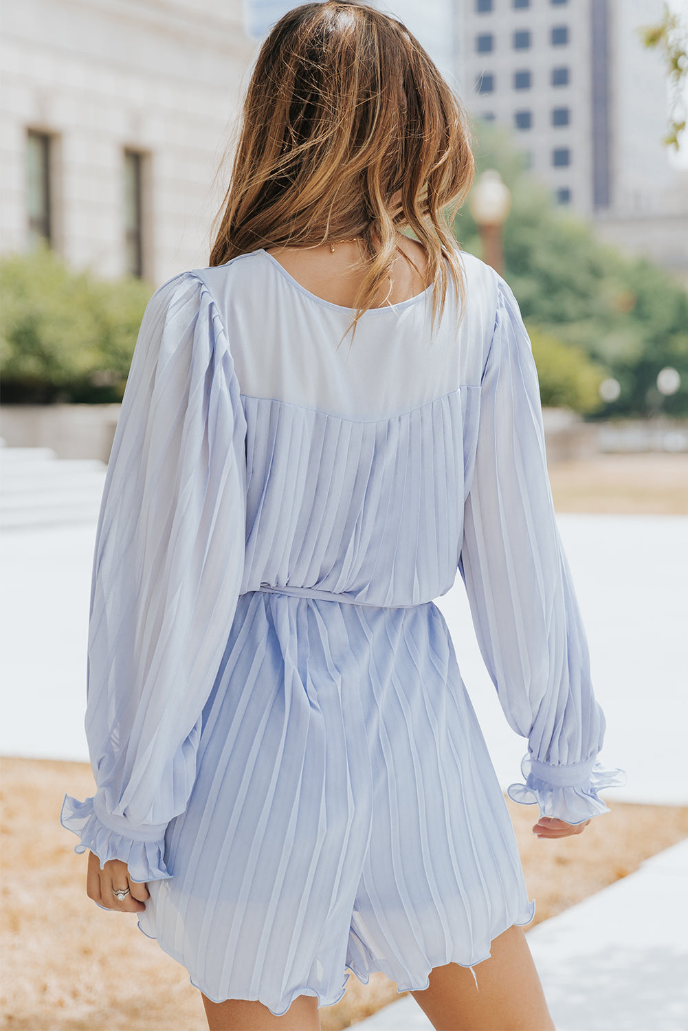 Sky Blue V-Neck Pleated Romper with Ruffles and Buttons at the Waist